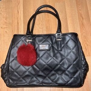 Medium size black GUESS purse.